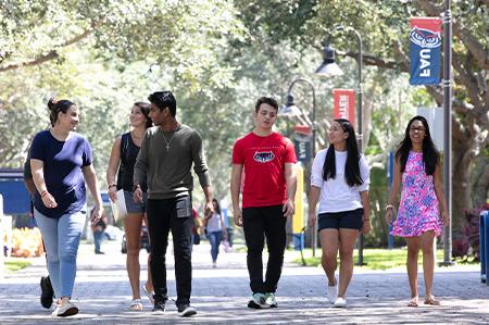 Students walking in the Honors College Campus